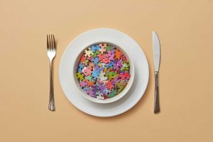 A bowl of puzzle pieces